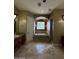 Bathroom boasts a soaking tub, shower, and a large window at 376 N Iron Horse Dr, Coolidge, AZ 85128