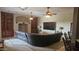 Spacious living room with large sectional sofa and built-in shelves at 376 N Iron Horse Dr, Coolidge, AZ 85128