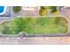 Expansive grassy backyard with a kidney shaped pool at 376 N Iron Horse Dr, Coolidge, AZ 85128