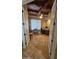 Home office with wood desk and tile flooring at 376 N Iron Horse Dr, Coolidge, AZ 85128