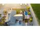 Aerial view of a house with a pool and a large backyard at 376 N Iron Horse Dr, Coolidge, AZ 85128
