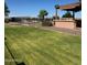 Expansive grassy lawn with partial views at 376 N Iron Horse Dr, Coolidge, AZ 85128