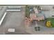 Aerial view of property showcasing a large house and horse stables at 376 N Iron Horse Dr, Coolidge, AZ 85128