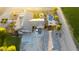 Aerial view of a house, pool, and attached garage at 376 N Iron Horse Dr, Coolidge, AZ 85128