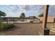Inviting kidney-shaped pool with pergola and lounge chairs at 376 N Iron Horse Dr, Coolidge, AZ 85128
