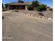 Landscaped front yard with a large one-story home at 376 N Iron Horse Dr, Coolidge, AZ 85128