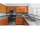 Kitchen features granite countertops and stainless steel appliances at 20100 N 78Th Pl # 2179, Scottsdale, AZ 85255