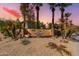 Community entrance with signage and landscaping at 14950 W Mountain View Blvd # 1203, Surprise, AZ 85374