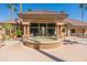 Resort-style pool with fountain and clubhouse view at 14950 W Mountain View Blvd # 1203, Surprise, AZ 85374