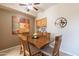 Charming dining area with a wooden table and built-in cabinets at 14950 W Mountain View Blvd # 1203, Surprise, AZ 85374