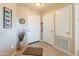 Bright entryway with tile floors and coat closet at 14950 W Mountain View Blvd # 1203, Surprise, AZ 85374