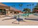 Community pool with spa and plenty of lounge chairs at 14950 W Mountain View Blvd # 1203, Surprise, AZ 85374