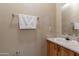 Clean bathroom with sink, vanity, and mirror at 14950 W Mountain View Blvd # 1203, Surprise, AZ 85374