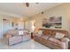 Spacious living room featuring two sofas and a relaxing atmosphere at 14950 W Mountain View Blvd # 1203, Surprise, AZ 85374