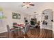 Bright dining area with wood floors and a four-person table at 3051 W Melinda Ln, Phoenix, AZ 85027