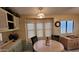 Bright dining area with bay window and built-in seating at 17200 W Bell Rd # 569, Surprise, AZ 85374