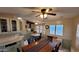 Dining area with table, chairs, and built-in window seat at 17200 W Bell Rd # 569, Surprise, AZ 85374