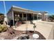 Charming single-wide home with covered porch and bicycle at 17200 W Bell Rd # 569, Surprise, AZ 85374