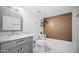 Bathroom with a bathtub, double vanity, and updated fixtures at 5122 N 31St Way # 227, Phoenix, AZ 85016