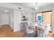 Dining area features a table and chairs, with kitchen and patio views at 5122 N 31St Way # 227, Phoenix, AZ 85016