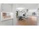 Bright dining area with hardwood floors and access to a patio at 5122 N 31St Way # 227, Phoenix, AZ 85016