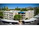 Apartment building with parking and mountain backdrop at 5122 N 31St Way # 227, Phoenix, AZ 85016