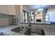 Kitchen features granite counters and stainless steel sink at 5122 N 31St Way # 227, Phoenix, AZ 85016
