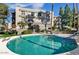 Inviting community pool with surrounding patio and landscaping at 5122 N 31St Way # 227, Phoenix, AZ 85016