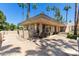 Community patio with tables, chairs, and golf course view at 5122 N 31St Way # 227, Phoenix, AZ 85016