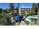 Building exterior with pool and lush landscaping at 5122 N 31St Way # 227, Phoenix, AZ 85016