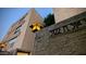 Evening view of building exterior with address and lamp at 5122 N 31St Way # 227, Phoenix, AZ 85016