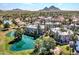 Aerial view of community by a lake and mountains at 5136 N 31St Pl # 612, Phoenix, AZ 85016