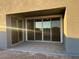 Covered patio with sliding glass doors at 7617 W Smoketree Dr, Peoria, AZ 85383