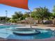 Enjoy the resort-style pool and spa with shade umbrellas at 2585 E San Miguel Dr, Casa Grande, AZ 85194