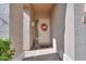 Front entry with a decorative wreath and small fountain at 29922 N Little Leaf Dr, San Tan Valley, AZ 85143