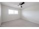 Bedroom with neutral walls, carpet, and ceiling fan at 7436 E Chaparral Rd # 265B, Scottsdale, AZ 85250