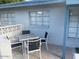 Small patio with a table and four chairs, perfect for outdoor dining at 2941 N 19Th Ave # 84, Phoenix, AZ 85015