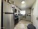 Modern kitchen with stainless steel appliances and ample cabinetry at 2941 N 19Th Ave # 84, Phoenix, AZ 85015