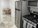 Updated kitchen featuring stainless steel appliances and wood-look flooring at 2941 N 19Th Ave # 84, Phoenix, AZ 85015
