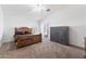 Main bedroom with wood furniture, carpet flooring, and private access to patio at 694 S Mountain View Rd, Apache Junction, AZ 85119