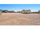 Large backyard with gravel and detached garage at 694 S Mountain View Rd, Apache Junction, AZ 85119