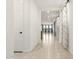 Hallway with tile floors and doors to other rooms at 19314 S 208Th Pl, Queen Creek, AZ 85142