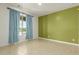 Bright dining room with tile floors and an accent wall at 19314 S 208Th Pl, Queen Creek, AZ 85142