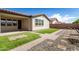 Landscaped backyard with artificial turf and pavers at 19314 S 208Th Pl, Queen Creek, AZ 85142