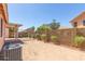 Spacious backyard with covered patio and gravel at 6730 E Preston St # 33, Mesa, AZ 85215