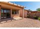 Covered patio with flagstone flooring and a gravel yard at 6730 E Preston St # 33, Mesa, AZ 85215