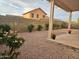 Backyard with covered patio and gravel landscaping at 6730 E Preston St # 33, Mesa, AZ 85215