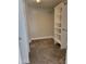 Large walk-in closet with built-in shelving and hanging rods at 427 E Mayfield Dr, San Tan Valley, AZ 85143