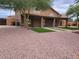 Large backyard with covered patio and artificial turf at 427 E Mayfield Dr, San Tan Valley, AZ 85143