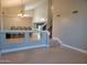 Spacious living room with high ceilings and elegant light fixture at 427 E Mayfield Dr, San Tan Valley, AZ 85143
